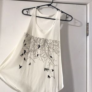 White top with small black birds
